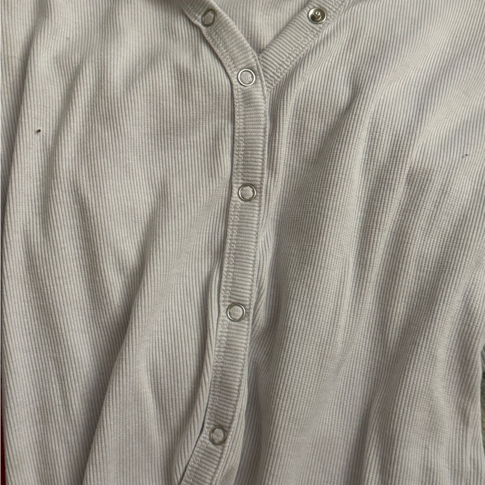 Two faded Rose shirts
